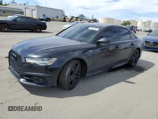 2016 Audi A6 Prestige with VIN WAUHGAFC4GN068723, listed as a Copart auction lot 52218195 with 194,894 mi miles and Salvage title. Bid and sale history available at DreamBid. Image 1.