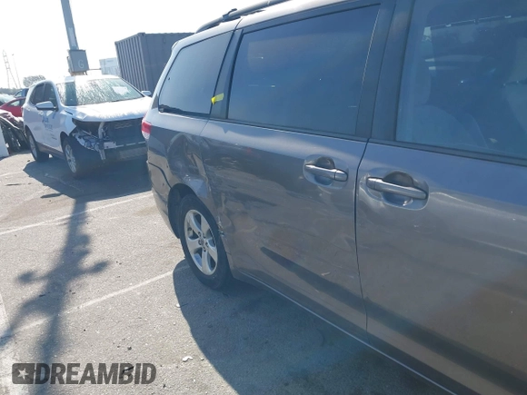 2014 Toyota Sienna LE AAS with VIN 5TDKK3DC6ES521706, listed as a IAAI auction lot 41999188 with 104,867 mi miles. Bid and sale history available at carsss.com. Image 6.