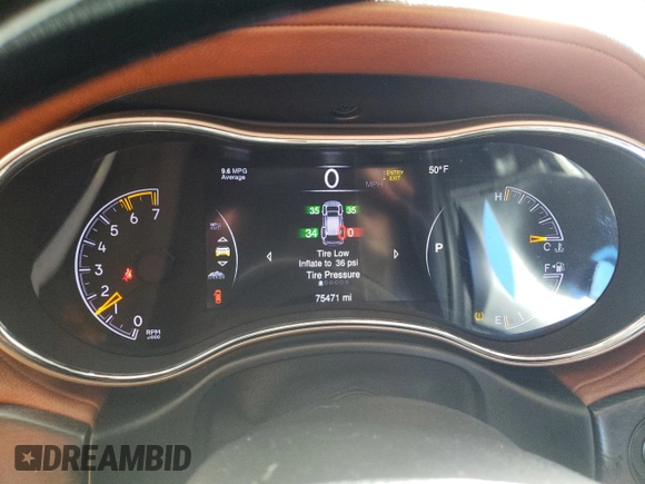 2015 Jeep Grand Cherokee Summit with VIN 1C4RJFJT1FC844975, listed as a Copart auction lot 45424455 with 75,471 mi miles and Salvage Title. Bid and sale history available at carsss.com. Image 9.
