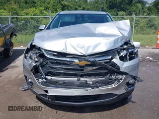 2019 Chevrolet Traverse LT Cloth z VIN 1GNERGKW3KJ293483, wystawiony jako IAAI lot #42524003 z przebiegiem 82 611 mil mil oraz . Historia ofert i sprzedaży dostępna na DreamBid. Obrazek 6.