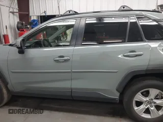 2019 Toyota RAV4 XLE with VIN JTMP1RFV2KD028137, listed as a IAAI auction lot 41931454 with 88,998 mi miles and . Bid and sale history available at DreamBid. Image 14.
