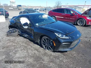 2025 Toyota 86 Premium z VIN JF1ZNBE12S9751742, wystawiony jako IAAI lot #41856067 z przebiegiem 1 272 mil mil oraz . Historia ofert i sprzedaży dostępna na DreamBid. Obrazek 1.