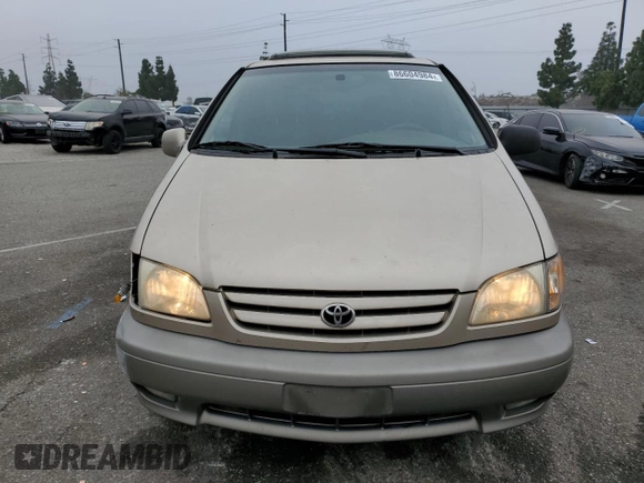 2001 Toyota Sienna LE with VIN 4T3ZF13C01U333507, listed as a Copart auction lot 86604984 with 192,377 mi miles and Salvage Title. Bid and sale history available at DreamBid. Image 5.