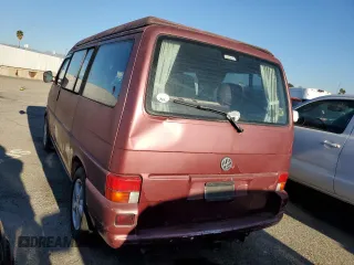 2003 Volkswagen EuroVan MV с VIN WV2NB47013H001081, выставлен на аукционе Copart как лот 82126354 с пробегом 158 433 миль миль и Чистый • Clean title. История ставок и продаж доступна на DreamBid. Изображение 2.