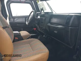 1997 Jeep Wrangler Sport with VIN 1J4FY19S2VP481780, listed as a IAAI auction lot 41822213 with 156,629 mi miles. Bid and sale history available at carsss.com. Image 5.