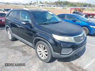 2011 Kia Sorento LX with VIN 5XYKT4A23BG055143, listed as a IAAI auction lot 42118676 with 174,268 mi miles. Bid and sale history available at carsss.com. Image 1.