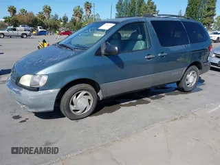 2002 Toyota Sienna LE with VIN 4T3ZF13C02U442678, listed as a IAAI auction lot 42241435 with 218,501 mi miles and . Bid and sale history available at DreamBid. Image 2.