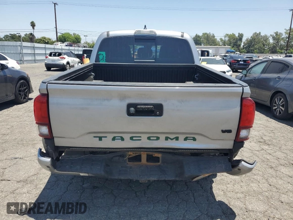 2019 Toyota Tacoma SR with VIN 3TMCZ5AN2KM277551, listed as a Copart auction lot 61586585 with 59,670 mi miles and Salvage title. Bid and sale history available at DreamBid. Image 6.