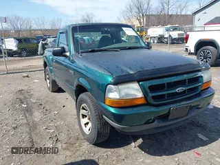 1999 Ford Ranger XL with VIN 1FTYR10C1XPB95732, listed as a IAAI auction lot 41802544 with 135,963 mi miles. Bid and sale history available at carsss.com. Image 1.