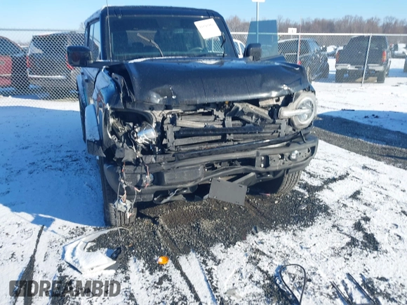 2021 Ford Bronco with VIN 1FMDE5BH7MLB07372, listed as a IAAI auction lot 41297961 with 80,291 mi miles. Bid and sale history available at carsss.com. Image 6.