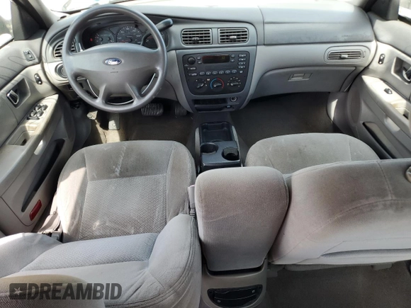 2003 Ford Taurus z VIN 1FAFP52243A153793, wystawiony jako Copart lot #55254105 z przebiegiem 89 668 mil mil oraz Szkody całkowita. Historia ofert i sprzedaży dostępna na DreamBid. Obrazek 8.