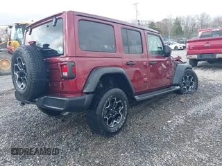 2021 Jeep Wrangler Unlimited Willys with VIN 1C4HJXDN8MW714976, listed as a IAAI auction lot 42080856 with 74,613 mi miles and . Bid and sale history available at DreamBid. Image 4.