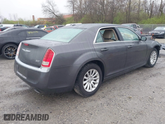 2014 Chrysler 300 with VIN 2C3CCAAG7EH377454, listed as a IAAI auction lot 41964310 with 277,209 mi miles. Bid and sale history available at carsss.com. Image 4.