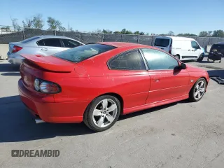 2006 Pontiac GTO z VIN 6G2VX12U46L833662, wystawiony jako Copart lot #48145245 z przebiegiem 66 828 mil mil oraz Tytuł czysty. Historia ofert i sprzedaży dostępna na DreamBid. Obrazek 3.