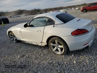 2012 BMW Z4 sDrive28i with VIN WBALL5C59CJ103051, listed as a Copart auction lot 87015834 with 92,071 mi miles and Salvage title. Bid and sale history available at DreamBid. Image 2.