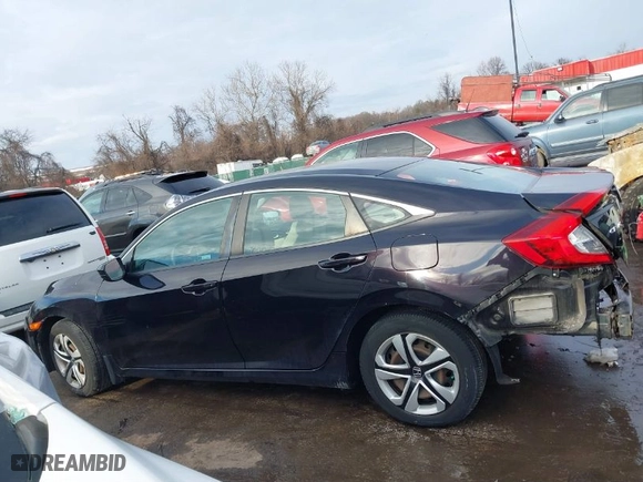 2018 Honda Civic Sedan LX with VIN 19XFC2F54JE209640, listed as a IAAI auction lot 41325243 with 106,191 mi miles. Bid and sale history available at carsss.com. Image 15.