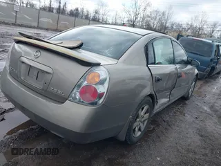 2003 Nissan Altima S with VIN 1N4AL11E83C228302, listed as a IAAI auction lot 41526591 with 235,140 mi miles. Bid and sale history available at carsss.com. Image 4.