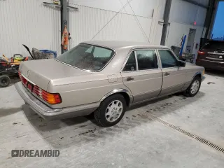 1990 Mercedes-Benz 560 with VIN WDBCA39E7LA517710, listed as a Copart auction lot 85307074 with 225,233 mi miles and Salvage Title. Bid and sale history available at DreamBid. Image 3.