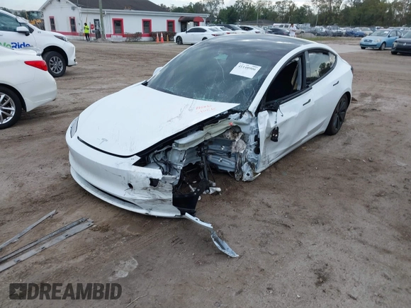 2024 Tesla Model 3 with VIN 5YJ3E1EA1RF869176, listed as a IAAI auction lot 41148906 with 1 mi miles. Bid and sale history available at carsss.com. Image 6.
