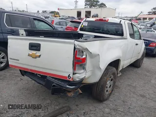 2018 Chevrolet Colorado 2WD Work Truck z VIN 1GCHSBEA2J1317431, wystawiony jako IAAI lot #38838974 z przebiegiem 132 231 mil mil oraz . Historia ofert i sprzedaży dostępna na DreamBid. Obrazek 4.