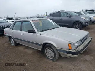 1985 Toyota Camry z VIN JT2SV16E9F0351378, wystawiony jako IAAI lot #42194705 z przebiegiem 192 476 mil mil oraz . Historia ofert i sprzedaży dostępna na DreamBid. Obrazek 1.