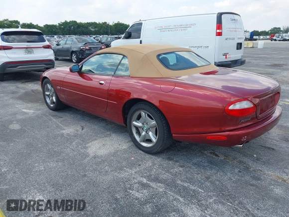 1997 Jaguar XK with VIN SAJGX2743VC017588, listed as a IAAI auction lot 42055716 with 66,052 mi miles and . Bid and sale history available at DreamBid. Image 3.