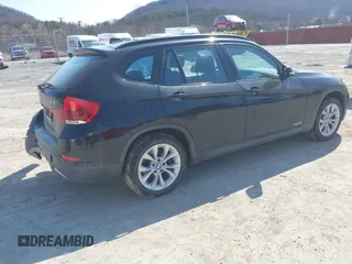 2013 BMW X1 xDrive28i with VIN WBAVL1C59DVR87469, listed as a IAAI auction lot 41775333 with 124,220 mi miles. Bid and sale history available at carsss.com. Image 4.