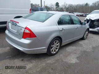 2011 Ford Fusion SEL with VIN 3FAHP0CG7BR170341, listed as a IAAI auction lot 42034192 with 128,279 mi miles. Bid and sale history available at carsss.com. Image 4.