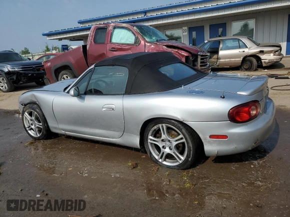 2005 Mazda MX-5 Miata LS with VIN JM1NB353X50410512, listed as a Copart auction lot 59663705 with 111,767 mi miles and Salvage title. Bid and sale history available at DreamBid. Image 2.