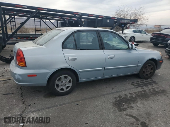 2004 Hyundai Accent GL with VIN KMHCG45C34U567915, listed as a Copart auction lot 43654985 with 141,461 mi miles and Clean Title. Bid and sale history available at carsss.com. Image 3.
