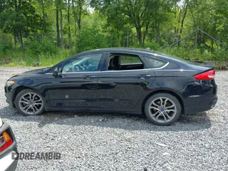 2017 Ford Fusion SE with VIN 3FA6P0H98HR331628, listed as a IAAI auction lot 42730977 with 47,248 mi miles and . Bid and sale history available at DreamBid. Image 14.