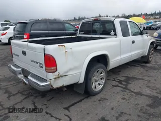 2003 Dodge Dakota SLT with VIN 1D7HL42N83S296040, listed as a IAAI auction lot 41462371 with 250,407 mi miles. Bid and sale history available at carsss.com. Image 4.