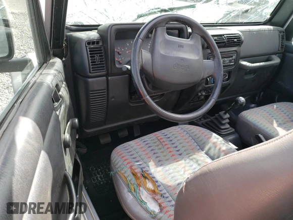 2003 Jeep Wrangler Sport with VIN 1J4FA49SX3P369375, listed as a Copart auction lot 71309184 with 0 mi miles and Salvage Title. Bid and sale history available at carsss.com. Image 8.