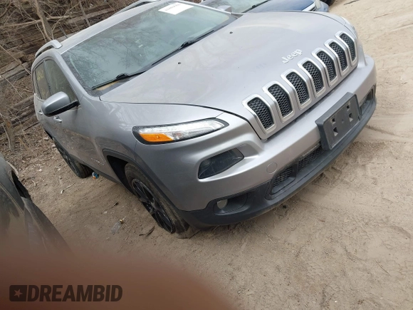 2016 Jeep Cherokee Latitude with VIN 1C4PJMCB7GW252724, listed as a IAAI auction lot 41869060 with 125,119 mi miles. Bid and sale history available at carsss.com. Image 1.