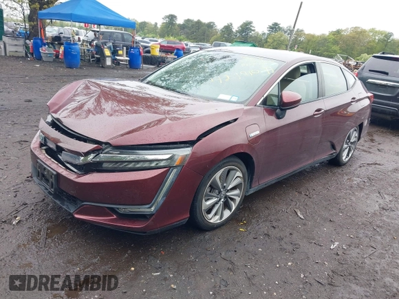 2018 Honda Clarity z VIN JHMZC5F12JC021958, wystawiony jako IAAI lot #42191071 z przebiegiem 29 423 mil mil oraz . Historia ofert i sprzedaży dostępna na DreamBid. Obrazek 18.
