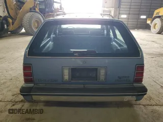 1989 Chevrolet Celebrity z VIN 1G1AW81R2K6232509, wystawiony jako Copart lot #55310485 z przebiegiem 84 848 mil mil oraz Tytuł czysty. Historia ofert i sprzedaży dostępna na DreamBid. Obrazek 6.