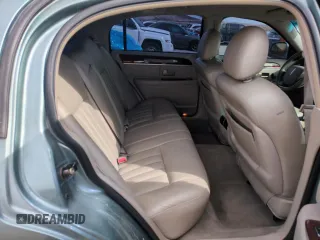 2005 Lincoln Town Car Signature z VIN 1LNHM81W75Y608000, wystawiony jako Copart lot #51570675 z przebiegiem 107 860 mil mil oraz Szkoda całkowita • Salvage title. Historia ofert i sprzedaży dostępna na DreamBid. Obrazek 10.