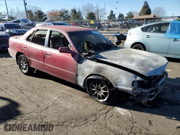 1993 Toyota Camry LE with VIN JT2SK12E8P0149731, listed as a Copart auction lot 83082154 with 197,590 mi miles and Salvage Title. Bid and sale history available at carsss.com. Image 4.