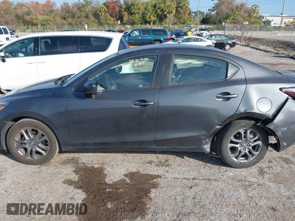 2019 Toyota Yaris Sedan L with VIN 3MYDLBYVXKY506966, listed as a IAAI auction lot 41455800 with 106,284 mi miles. Bid and sale history available at carsss.com. Image 14.