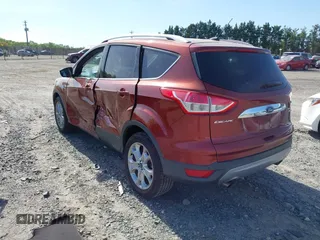 2016 Ford Escape Titanium with VIN 1FMCU9JX9GUA16892, listed as a IAAI auction lot 42110986 with 87,775 mi miles and . Bid and sale history available at DreamBid. Image 3.