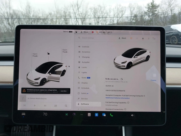 2020 Tesla Model 3 Standard Range Plus with VIN 5YJ3E1EA7LF659172, listed as a IAAI auction lot 42017026 with 32,104 mi miles. Bid and sale history available at carsss.com. Image 18.