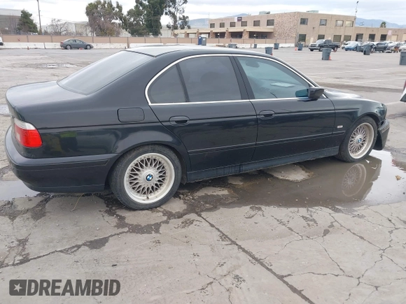 2001 BMW 5 Series 525iA with VIN WBADT43451GX20026, listed as a IAAI auction lot 41490075 with 141,700 mi miles. Bid and sale history available at carsss.com. Image 4.