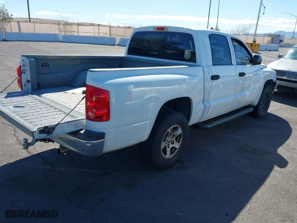 2006 Dodge Dakota SLT with VIN 1D7HE48N96S588558, listed as a IAAI auction lot 41831955 with 179,544 mi miles. Bid and sale history available at carsss.com. Image 4.