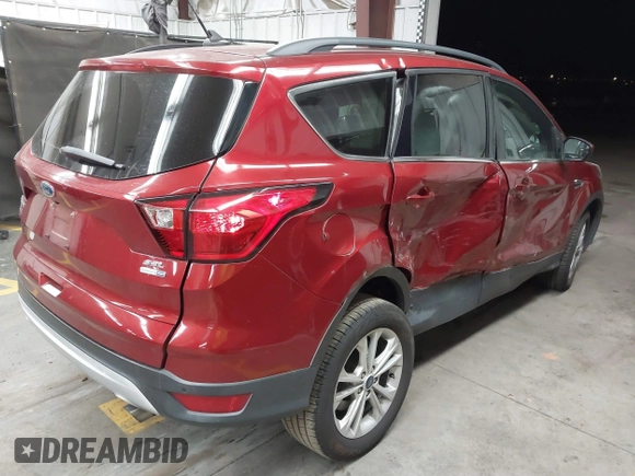 2019 Ford Escape SEL with VIN 1FMCU9HD7KUB83031, listed as a IAAI auction lot 41837035 with 70,424 mi miles. Bid and sale history available at carsss.com. Image 4.