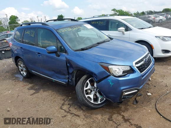 2017 Subaru Forester Touring with VIN JF2SJAWC7HH455648, listed as a IAAI auction lot 42118358 with 58,123 mi miles and . Bid and sale history available at DreamBid. Image 1.