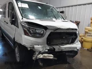 2023 Ford Transit Passenger XL with VIN 1FBAX2YGXPKA45186, listed as a IAAI auction lot 41625035 with 42,174 mi miles and . Bid and sale history available at DreamBid. Image 6.
