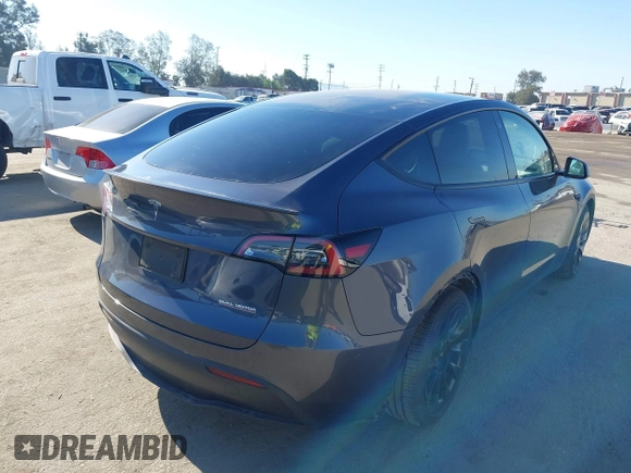 2022 Tesla Model Y Performance z VIN 7SAYGDEF2NF490794, wystawiony jako IAAI lot #42218742 z przebiegiem 41 402 mil mil oraz . Historia ofert i sprzedaży dostępna na DreamBid. Obrazek 4.