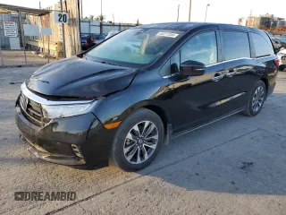 2023 Honda Odyssey EX-L with VIN 5FNRL6H66PB060032, listed as a Copart auction lot 83077304 with 15,169 mi miles and Salvage Title. Bid and sale history available at carsss.com. Image 1.