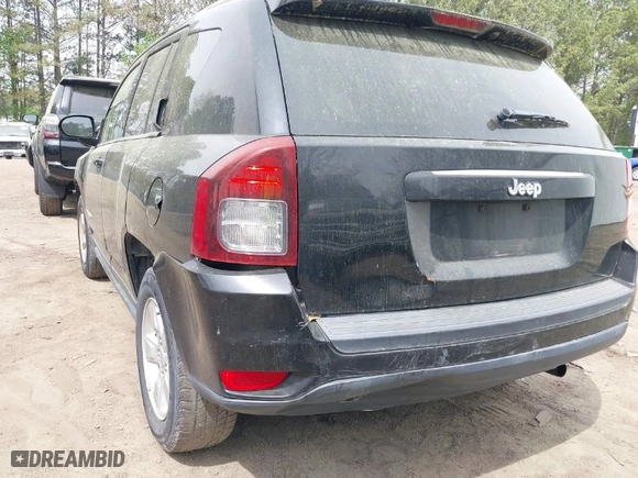2014 Jeep Compass Sport with VIN 1C4NJCBA8ED844538, listed as a IAAI auction lot 41951190 with 157,000 mi miles. Bid and sale history available at carsss.com. Image 6.