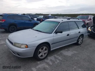 1997 Subaru Legacy Wagon L with VIN 4S3BK4350V7309435, listed as a IAAI auction lot 40521784 with 200,182 mi miles. Bid and sale history available at carsss.com. Image 17.
